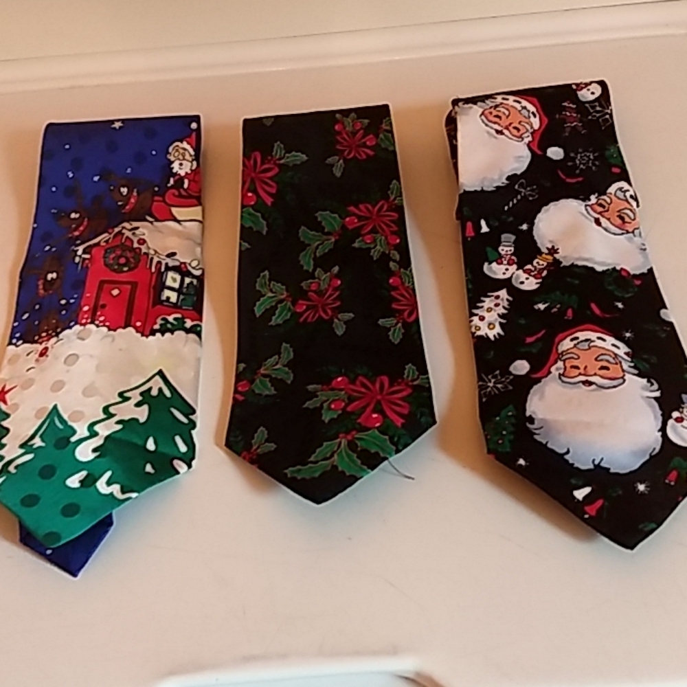 3 Christmas themed neckties. Santa, mistletoe